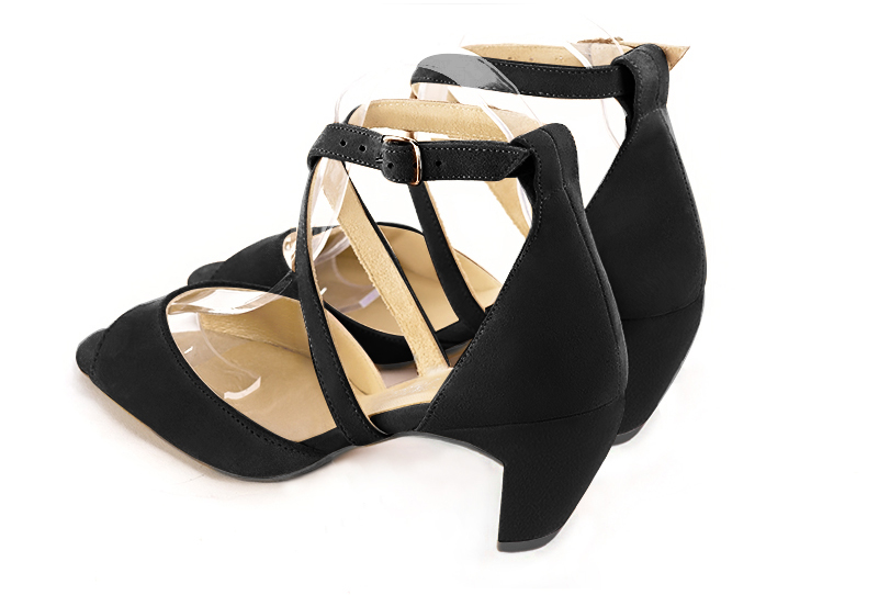 Matt black women's closed back sandals, with crossed straps. Square toe. Medium comma heels. Rear view - Florence KOOIJMAN